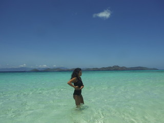 Fototapeta na wymiar tanned woman beach paradise