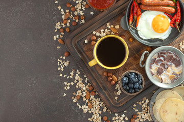 Fototapeta na wymiar Healthy breakfast on an old background