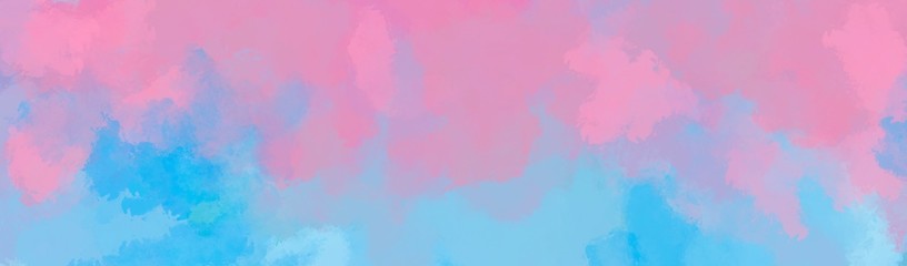 Colorful watercolor background of abstract sunset sky with puffy clouds in bright rainbow colors of pink, blue and purple