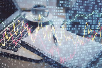 Double exposure of forex chart drawing and desktop with coffee and items on table background. Concept of financial market trading