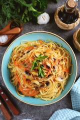Vegetarian lenten pasta with mushroom sauce, tomatoes, onions, garlic and parsley. Healthly food.