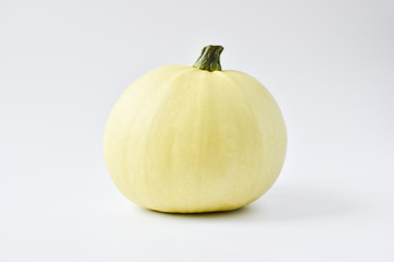 Isolated on a white background, there is one white pumpkin