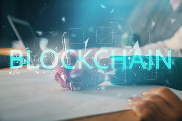 Double exposure of blockchain theme drawing over people taking notes background. Concept of cryptocurrency