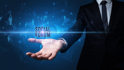 Elegant hand holding SOCIAL FORUM inscription, social networking concept