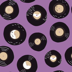 Vinyl records hand drawn seamless pattern on purple background.Endless design for wrapping paper,textile print and other