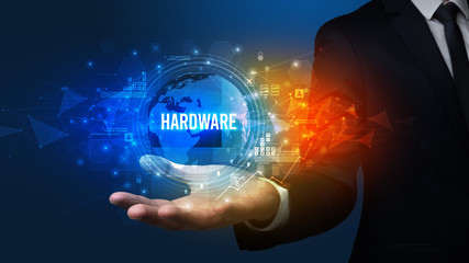 Elegant hand holding HARDWARE inscription, digital technology concept