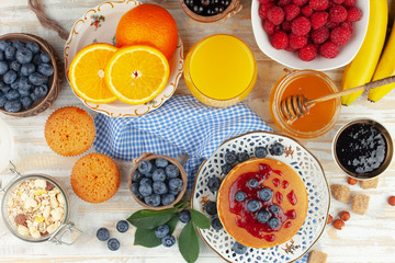 Fototapeta na wymiar Healthy breakfast on an old background