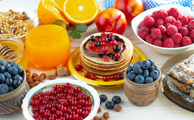 Healthy breakfast on an old background. The concept of tasty and healthy food.