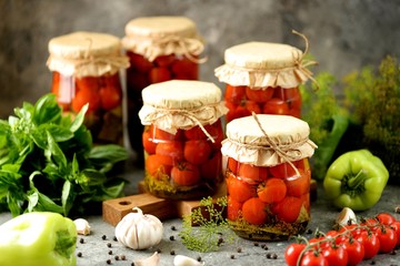 Homemade pickled cherry tomatoes with dill and garlic.