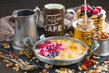 Healthy breakfast on an old background. The concept of tasty and healthy food.