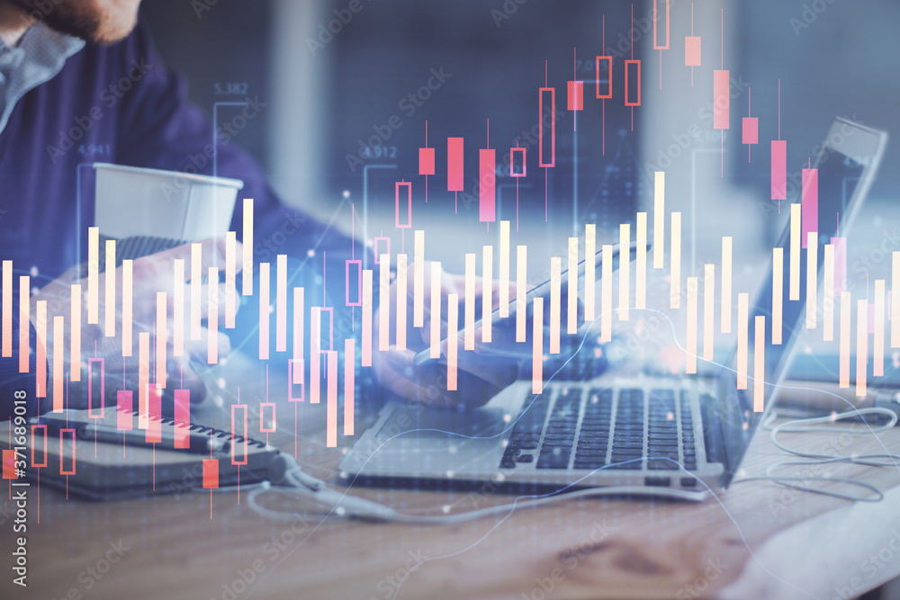 Aufkleber double exposure of man's hands holding and using a phone and financial graph drawing. analysis conce