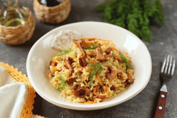 Fried rice with chanterelles 
 mushrooms, onions, carrots and celery.