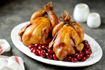 Griled chicken with Cornelian cherries. 