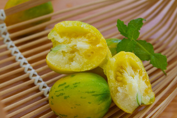 Yellow color fruit tomato close up
