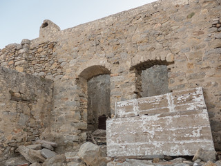 Abandoned village of Mikro Chorio. Ruins on the hill. Tilos Island, Dodecanese, Greece.
