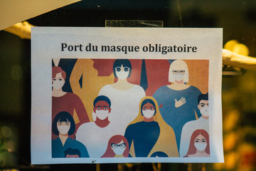 View of an information poster to protect yourself from the coronavirus at the entrance to stores in...