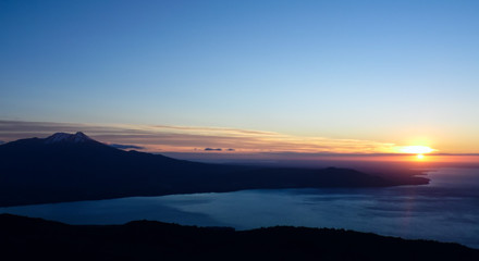 Sunrise over Calbuco Volcano. Shot taken from the base of the ski center of Osorno Volcano.