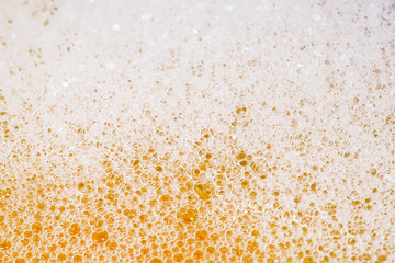 Macro photo of beer or soap foam and bubbles background