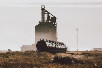 Rail Cars and Grain Silos on the Prairies  © David