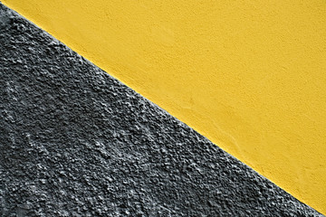 Diagonal yellow and gray abstract background.