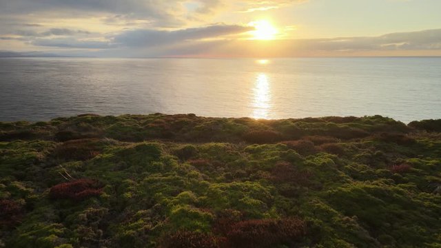 The environment of the Pe&ntilde;as Lighthouse is incredibly beautiful. It is located in Asturias, Spain, and it is considered the north of the north. Sunset colours over landscape creates an amazing scene.