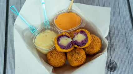 French Fries with Cheese and Chicken Nuggets