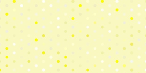 Light yellow vector pattern with spheres.