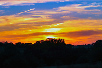 Fototapeta na wymiar Sunset on a Cool August Evening
