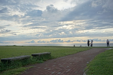 Sunset. Beautiful sunset at Japanese sea. Gold sea sunset. Picture Sea sunset.