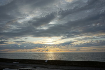 Sunset. Beautiful sunset at Japanese sea. Gold sea sunset. Picture Sea sunset.