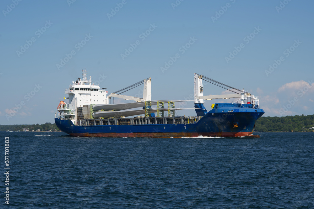 Wall mural a large carrier boat on a river