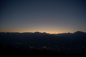 Naklejka premium view of mountain silhouette on twilight sky after sunset, Japanese alps, Hakuba, Japan