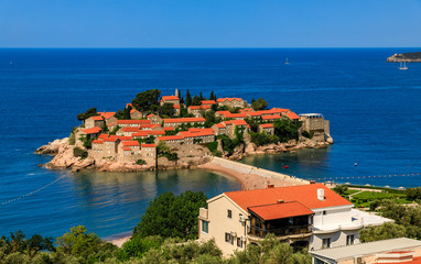 Naklejka na ściany i meble View of Sveti Stefan luxury resort island on the Adriatic sea coast, Montenegro