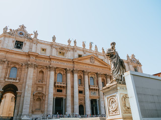 Fototapeta na wymiar Statue of St Peter and St. Peter's Basilica