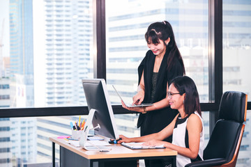 business woman working in office and talking with team