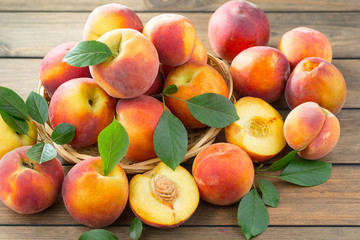 Ripe peaches on an old background