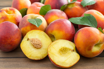 Ripe peaches on an old background
