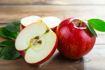 Red apples on old background