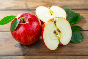 Red apples on old background