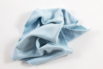 A crumpled blue microfiber cloth. Fabric.