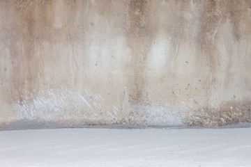 Old and dirty cement walls and new concrete floor for background.