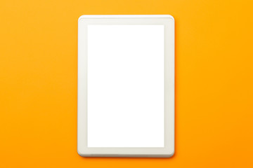 Tablet computer screen mockup with clipping path on orange background.