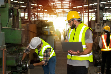 Technicians are checking the readiness of the machines in the factory.