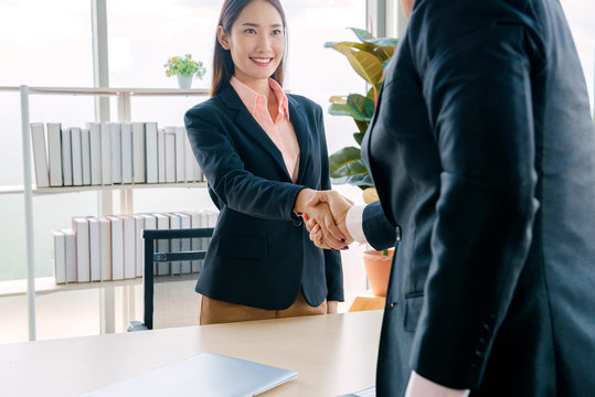 Handshake of business woman