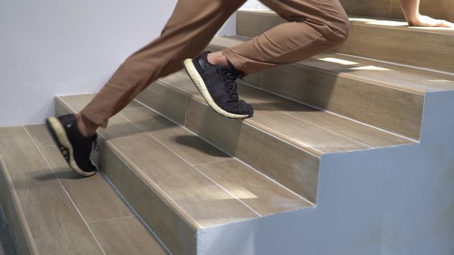 Adult man slip and falling down stair