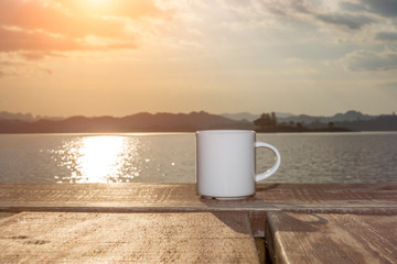 White coffee mug on wooden