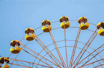 ferris wheel against blue sky
