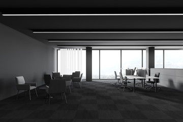 Workspace in grey open space office interior