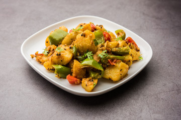 Aloo shimla mirch sabji or dry Potato Capsicum curry is an indian main course recipe