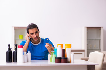 Young man selling cosmetics via internet